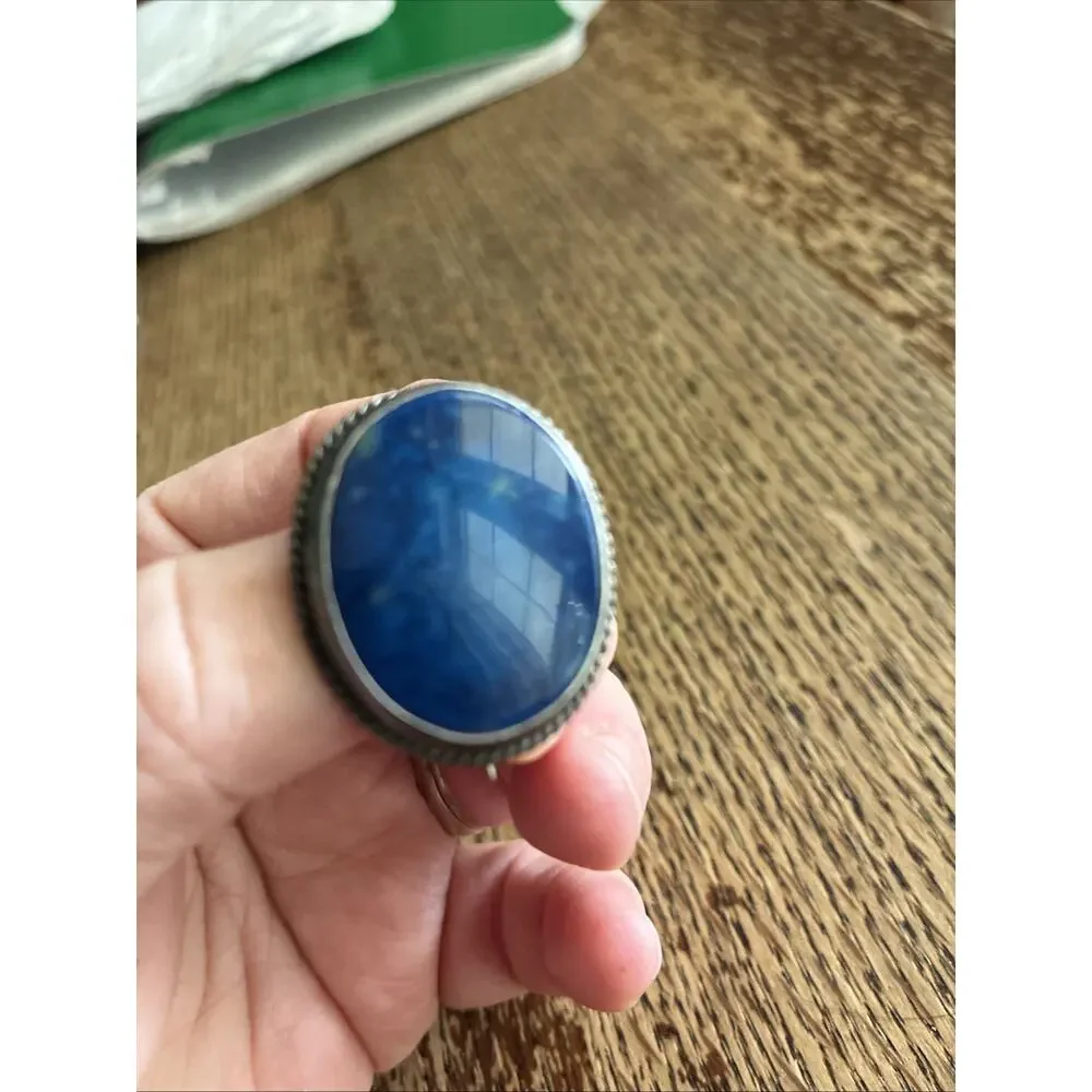 A Vintage Navajo Sterling Silver Sand Cast Brooch With A Lapis Cabochon